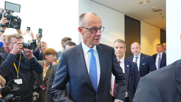 Merz macht erste Besuche in Paris und Warschau