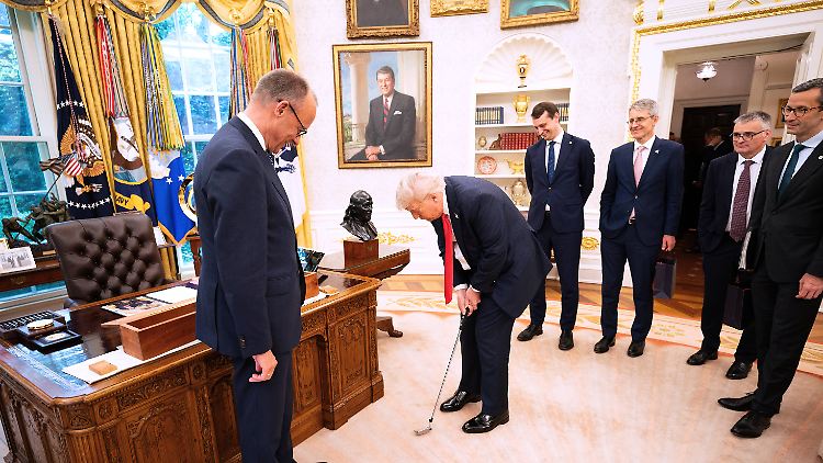 Merz schenkt Trump Golfschläger - und bekommt selbst etwas